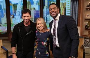 Kelly Ripa and Michael Strahan talk with Harry Connick, Jr., during the production of "Live! with Kelly and Michael" in New York