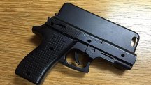 A gun-shaped iPhone case which a passenger carried through security at Stansted Airport (Essex Police/PA)