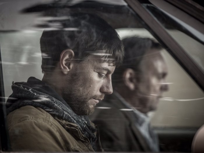 Patrick Fugit and Philip Glenister in Outcast (2016)