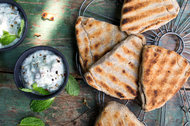 For a summery twist on this buttery flatbread, stuff it with dates and grill it.