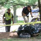 Authorities at the scene of a motorcycle crash on Philips Parkway in Montvale on Friday, Aug. 19, 2016. 
