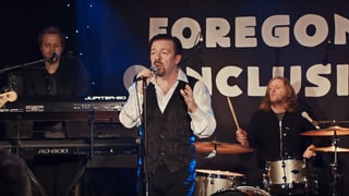 See Ricky Gervais Croon for David Brent's Hometown 'Slough'