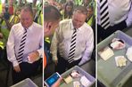 Grabs from the Buzzfeed video - "Mike Ashley gets searched... Yes. That is a massive wad of £50 notes he just took out his pocket"