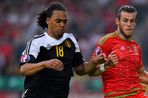 Jason Denayer in action against Wales' Gareth Bale