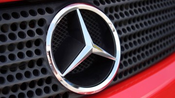 1472872251_mercedes-logo-on-car-front-iphone-1440x900