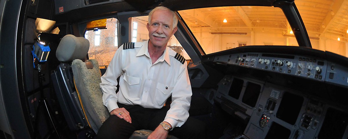 At the Carolinas Aviation Museum in 2011, Captain Chesley "Sully" Sullenberger sits in the cockpit of the Airbus A320 he ditched in the Hudson River on January 15, 2009.
