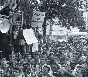 Robert Kennedy, pictured at a Washington rally, waxed cautious on advancing the cause of black equality.
