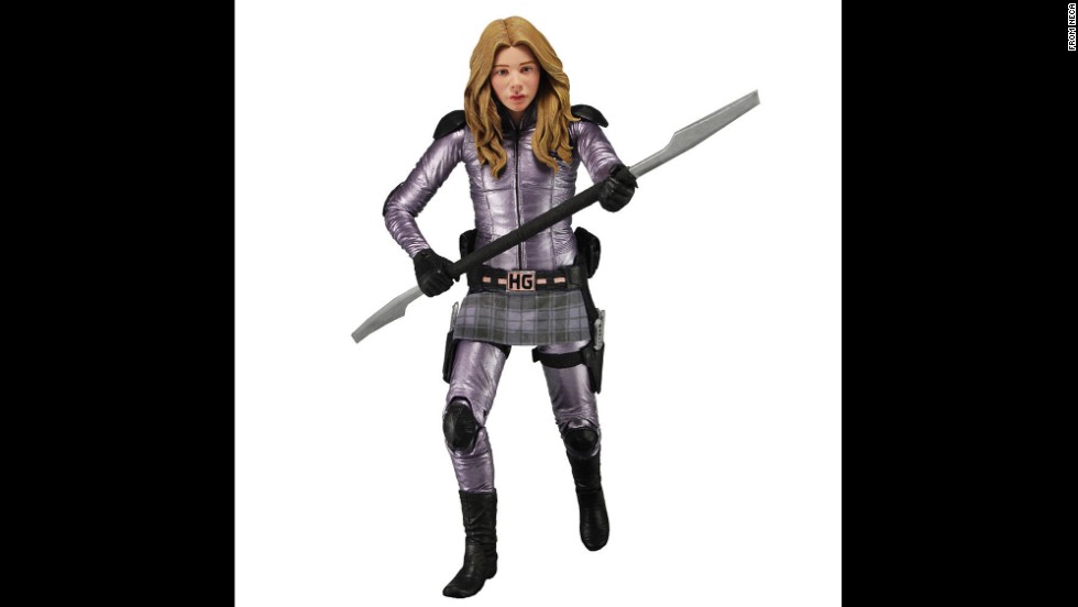 Hit Girl is one of Marvel Comics&#39; crime-fighting &quot;Kick Ass&quot; crew. The young assassin projects elements of school-girl innocence with her plaid skirt and purple color scheme. But the spear-wielding action figure is all business.