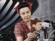 (Alfred Palmer/ Office of War Information/Library of Congress)
Woman working on an airplane motor at North American Aviation, Inc., Calif.