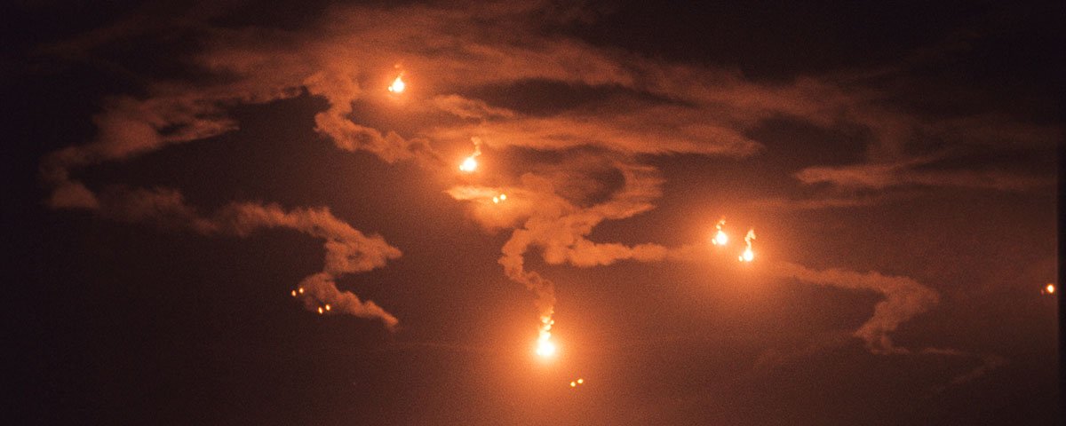 Flares light up Da Nang harbor during the Tet Offensive in 1968.