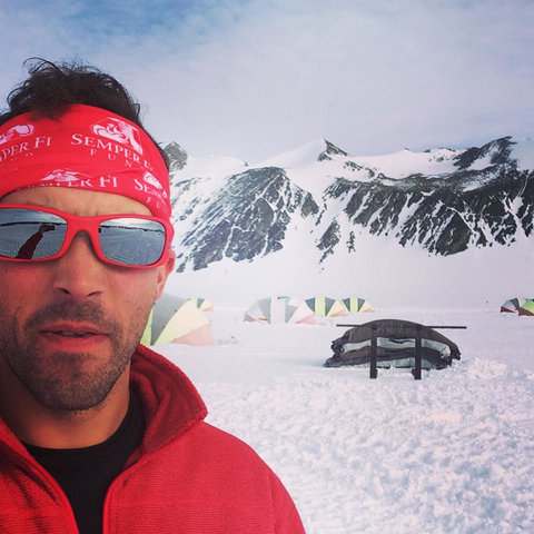 Capt. Calum Ramm at the Antarctica Logistics and Expedition base camp on Union Glacier. The tents in the back were the team’s lodging.
