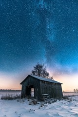 Old barn under the stars