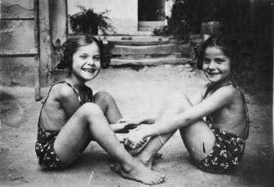 Twins sisters before being sent to Auschwitz for experiments. - (Photo courtesy of the United States Holocaust Memorial Museum)