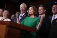 The House minority leader, Nancy Pelosi, center, at a news conference in Washington.