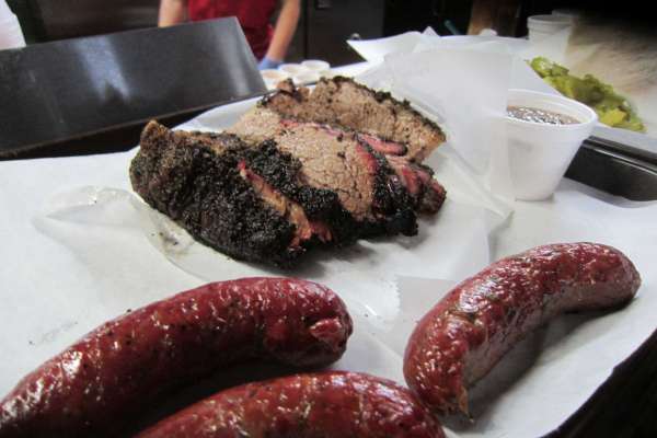 Brisket and housemade sausage as served at Louie Mueller Barbecue in Taylor
