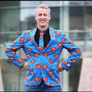 ‘Superhero’ Niall Crofton used his suit to make his point Photo: Steve Humphreys