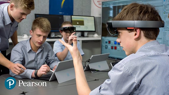 A high school student uses HoloLens during a classroom lesson