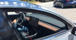 Tesla Model 3: test car seems to indicate the interior will feature a  big central screen, but with no conventional dash or dials.