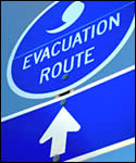 	Señal de tránsito indicando la ruta de evacuación en caso de huracán.