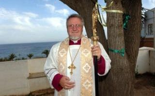 Bishop Geoffrey Rowell outside the church at Praia Da Luz, Portugal, in May 2007, soon after the disappearance of Madeleine McCann