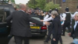 Comment: Angry protesters surround Theresa May in Kensington