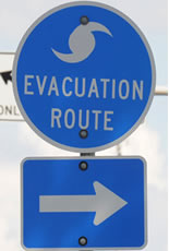 	Hurricane evacuation sign with arrow pointing to the right.