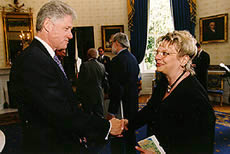President Clinton greets Joan Echtenkamp Klein. Photo courtesy of the White House