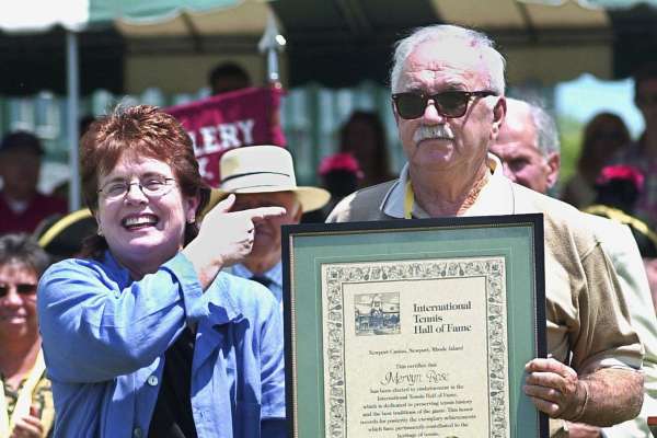 (FILES) This file photo taken on July 14, 2001 shows Billie Jean King (L) presenting former tennis star Mervyn Rose (R) with a certificate after being inducted into the International Tennis Hall of Fame in Newport, Rhode Island. Australian two-time Grand Slam singles champion Mervyn Rose, who went on to coach greats Margaret Court and Billie Jean King, has died, tennis officials said on July 25, 2017. / AFP PHOTO / JOHN MOTTERNJOHN MOTTERN/AFP/Getty Images