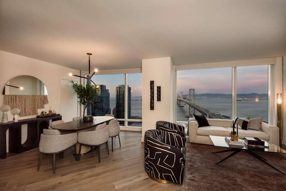 The living room offers unobstructed views of the Bay Bridge, and beautifully laid diagonal flooring. Photo: Visualhouse_Life