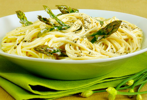 Bowl of spaghetti with asparagus