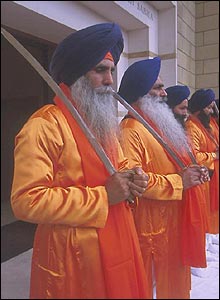 Sikhs guards with swords 