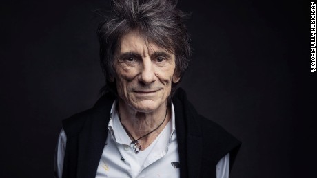 FILE - In this Nov. 14, 2016 file photo, Ronnie Wood of the Rolling Stones poses for a portrait in New York. A spokesperson for Ronnie Wood confirmed Wednesday, May 24, 2017, that during a recent routine medical screening, doctors discovered a small lung lesion which was successfully treated. The band&#39;s upcoming tour will not be affected. (Photo by Victoria Will/Invision/AP, File)