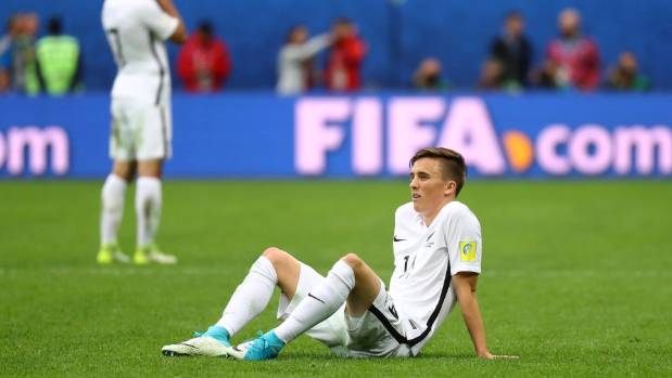 A dejected Ryan Thomas looks on after New Zealand's 4-0 defeat to Portugal.