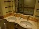 Ocean suite bathrooms feature a double sink and plenty