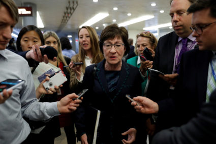 FILE PHOTO: Sen. Susan Collins (R-ME) speaks with reporters ahead of the party luncheons on Capitol Hill in Washington, U.S., October 3, 2017. REUTERS/Aaron P. Bernstein/File Photo - RC1965F32030