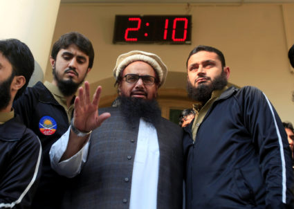 Hafiz Saeed speaks with supporters after attending Friday prayers in Lahore, Pakistan on Nov. 24. Photo by Mohsin Raza/Reuters