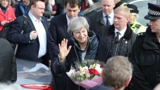 Theresa May visits Salisbury after 'brazen' nerve agent attack