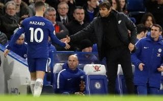 Antonio shakes hands with Eden Hazard