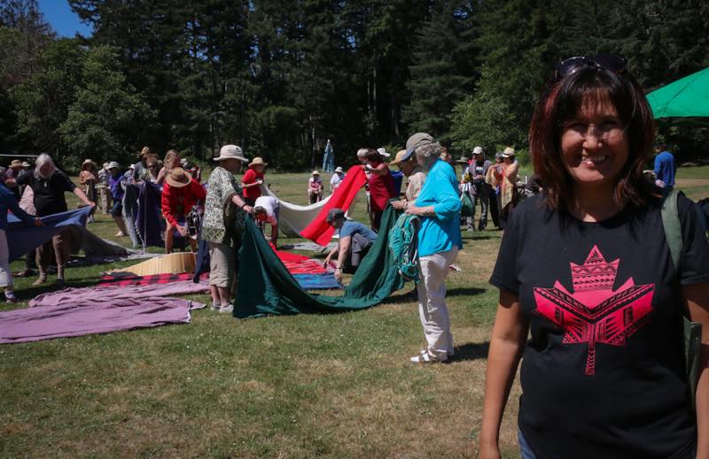 Lillian Underwood leads the Kairos Blanket Exercise on Pender Island, British Columbia, as part of a reconciliation project with Tsawout First Nation.