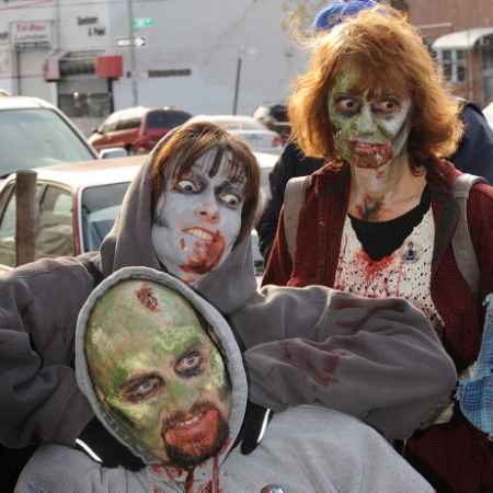 Zombie enthusiasts Carol and Ray Nocella and Lara of Bayside, Queens walk along 21st Street in Astoria during the first Queens Zombie Walk in Astoria.