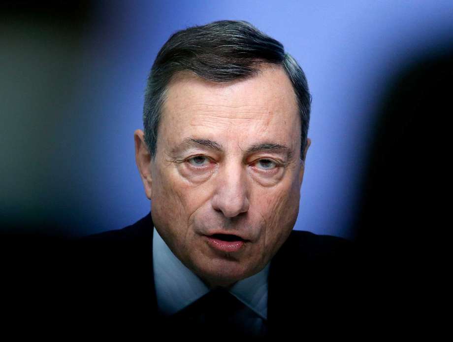 FILE - In this Thursday, Dec. 14, 2017 file photo, President of the European Central Bank Mario Draghi speaks during a news conference in Frankfurt, Germany. Weaker signals from the economy and worries about a trade war between the United State and China mean the European Central Bank is in no hurry at all to start withdrawing its monetary stimulus efforts. And that means markets and consumers will have to live with central bank interest rates at zero and in some cases below for a good while yet. Photo: Michael Probst, AP / Copyright 2017 The Associated Press. All rights reserved.