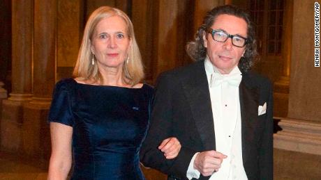 FILE - In this Dec. 11, 2011 file photo, Swedish Academy member Katarina Frostenson, left and photographer Jean Claude Arnault attend the Kings Nobel dinner at the Royal Palace in Stockholm. The Nobel Prize in literature will be not awarded this year following sex-abuse allegations and other issues within the ranks of the Swedish Academy that selects the winner, it was announced on Friday, May 4, 2018. The Swedish Academy&#39;s internal feud was triggered by an abuse scandal linked to Jean-Claude Arnault, a major cultural figure in Sweden who is also the husband of poet Katarina Frostenson, an academy member. (Henrik Montgomery/TT News Agency via AP, File)