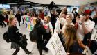 Welcome parties greet emigrants home to vote at Dublin Airport