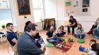  Parent Matt Healy reading a story at the London Irish Playgroup  in the London Irish Centre in Camden. Photograph: Malcolm McNally