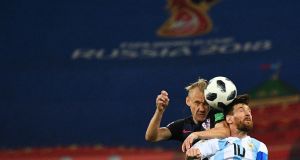 Croatia’s defender Domagoj Vida challenges Argentina’s Lionel Messi in Nizhny Novgorod. Photograph: Getty Images