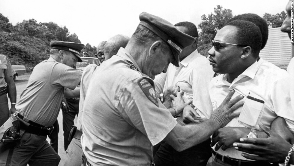 Mississippi patrolmen shove King during the 220-mile &quot;March Against Fear&quot; from Memphis, Tennessee, to Jackson, Mississippi, on June 8, 1966.