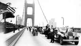 President Franklin D. Roosevelt visits the San Francisco Bay Area, July 14, 1938, seen here taking off his hat for the Natoinal  Anthem, during his crossing the Golden Gate Bridge