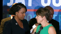 BOSTON, MA. - SEPTEMBER 5:  Boston City Councilor and Democratic congressional candidate Ayanna Pressley, left, prepares to speak after Attorney General Maura Healey introduced her during a Democratic Party unity rally on September 5, 2018 in Dorchester, Massachusetts. (Staff Photo By Angela Rowlings/Boston Herald)