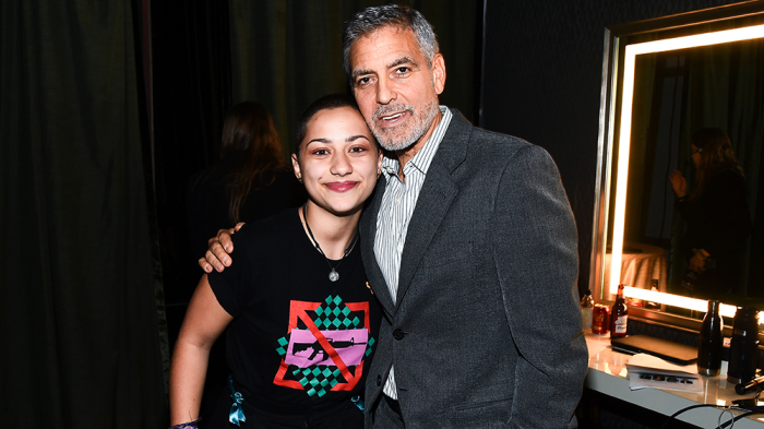Emma Gonzalez and George Clooney attend