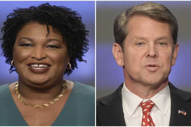This combination of May 20, 2018, photos shows Georgia gubernatorial candidates Stacey Abrams, left, and Brian Kemp in Atlanta. Democrats and Republicans nationwide will have to wait a bit longer to see if Georgia elects the first black woman governor in American history or doubles down on the Deep South's GOP tendencies with an acolyte of President Donald Trump
